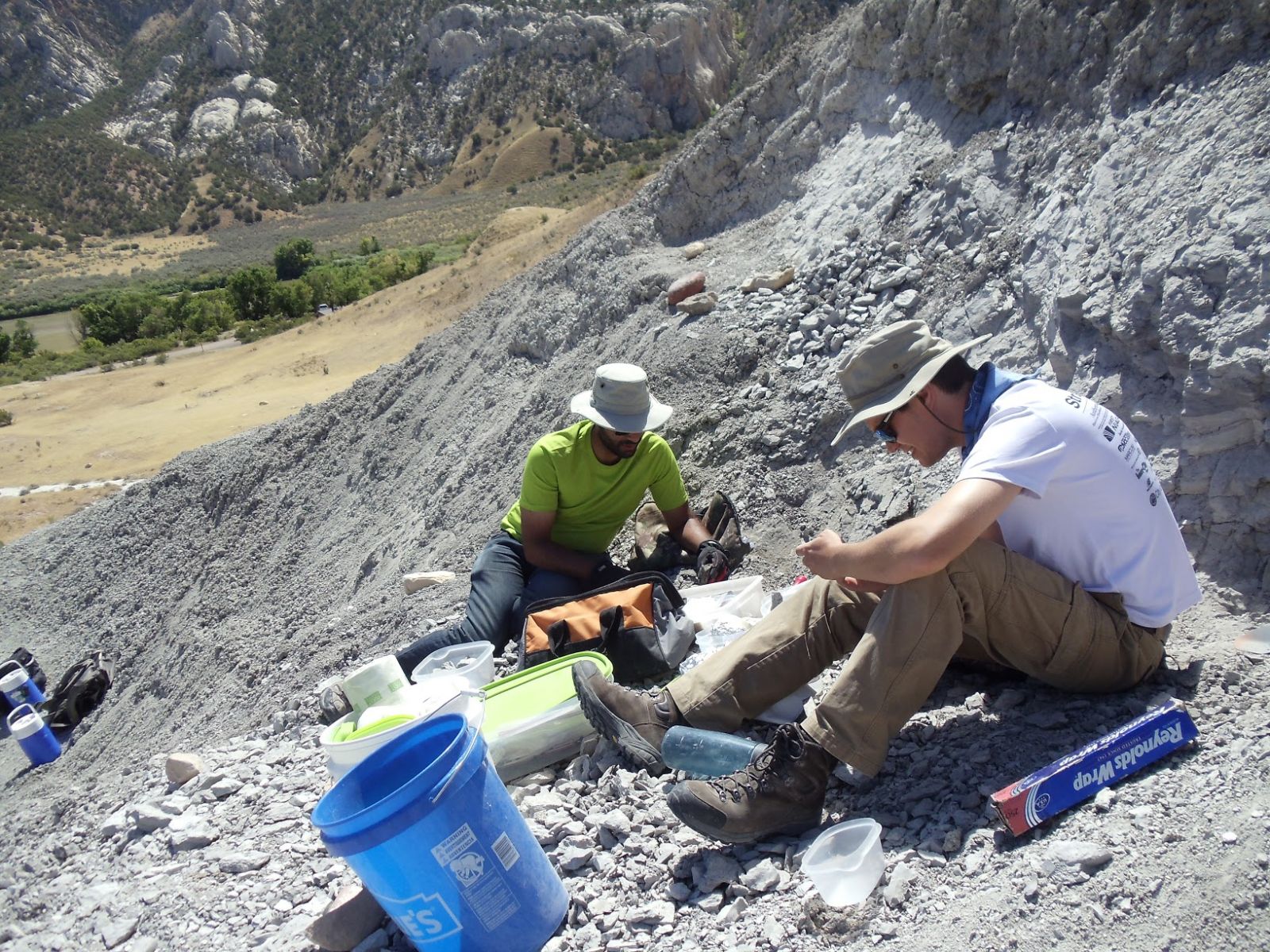 Bhart-Anjan Bhullar and Matt Davis excavating Jurassic fossils